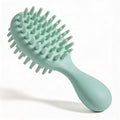 Soothing Scalp Massage Brush - mint silicone bristles with ergonomic handle